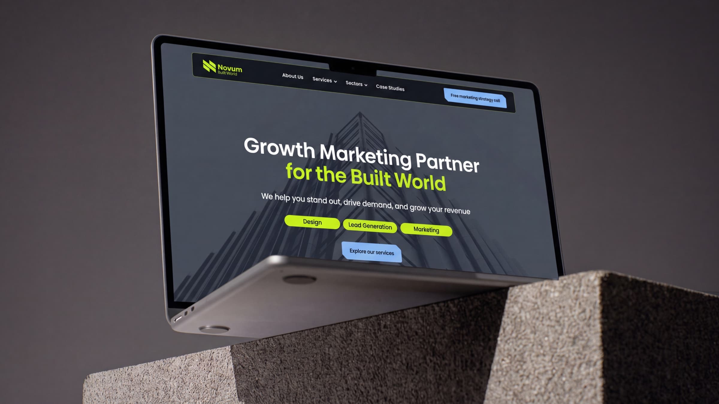 Novum Built World website on a laptop with the headline Growth Marketing Partner for the Built World